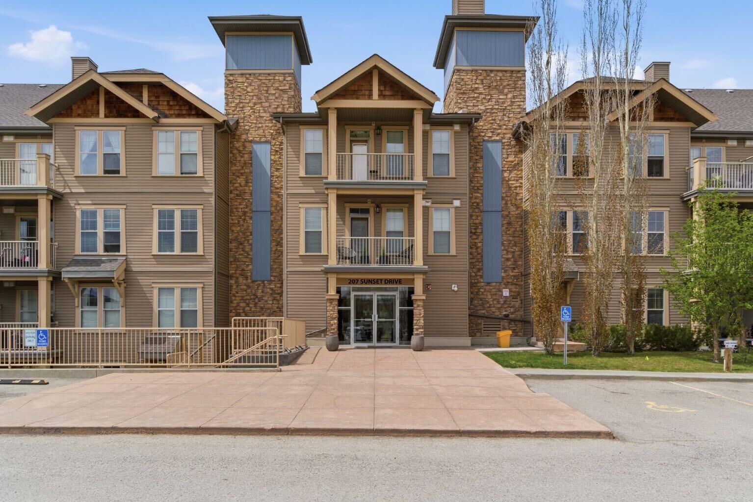 Property Photo: 207 Sunset Drive 408 AB T4C 0H8