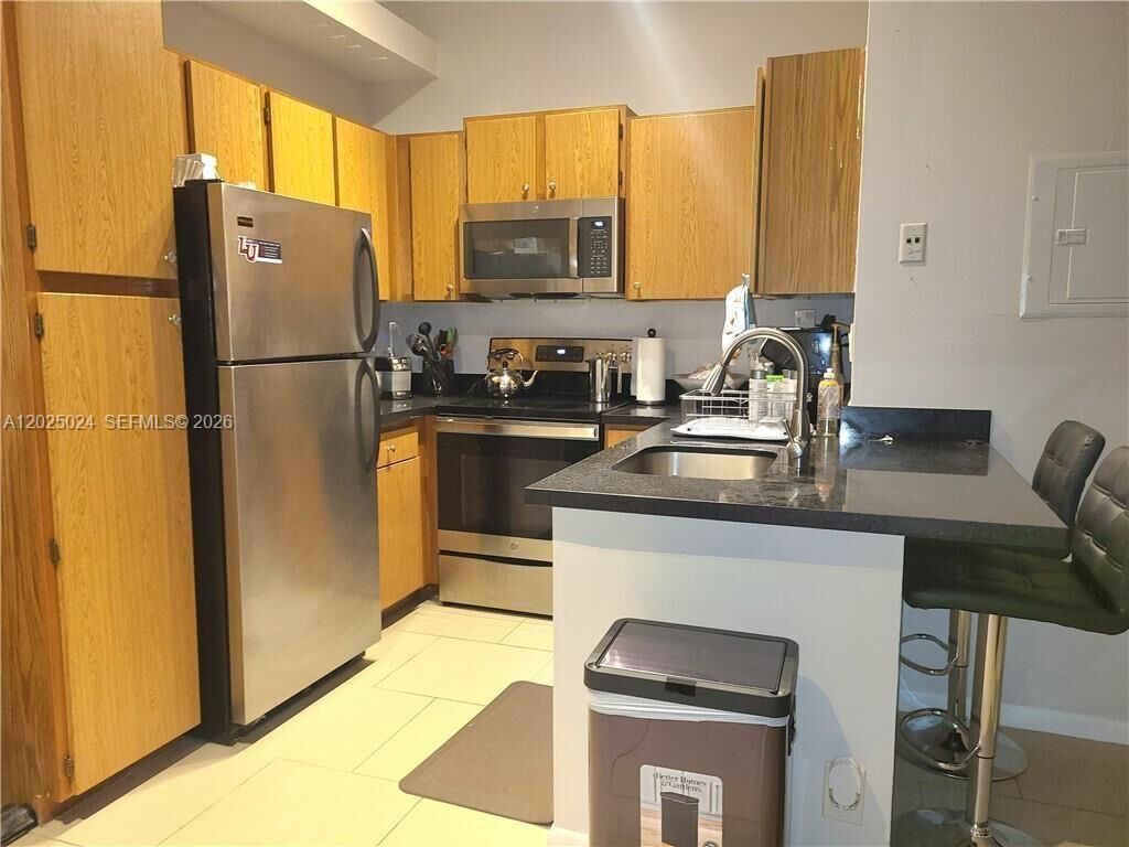 Property Photo: 631 Lyons Rd 12205 FL 33063
