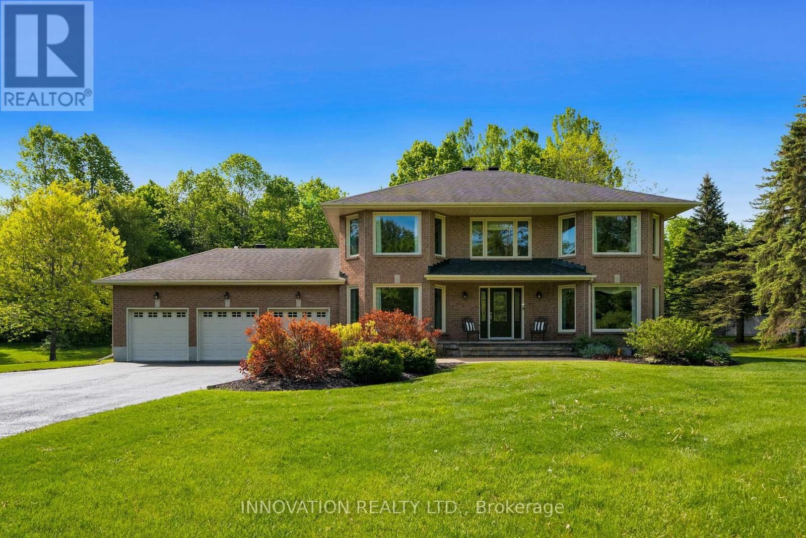 Property Photo: 1410 Sherruby Way ON K2W 1B1