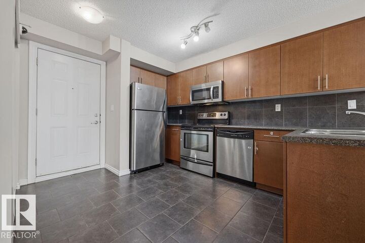 Property Photo: 10118 106 Avenue NW 204 AB T5H 0B8