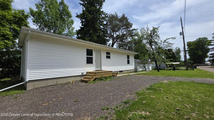 Property Photo:  825 Dunlap Street  MI 48910 