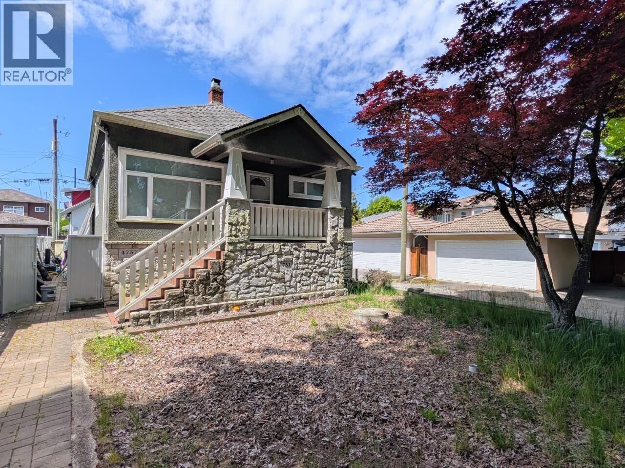 Property Photo:  4751 Henry Street  BC V5V 4Z2 