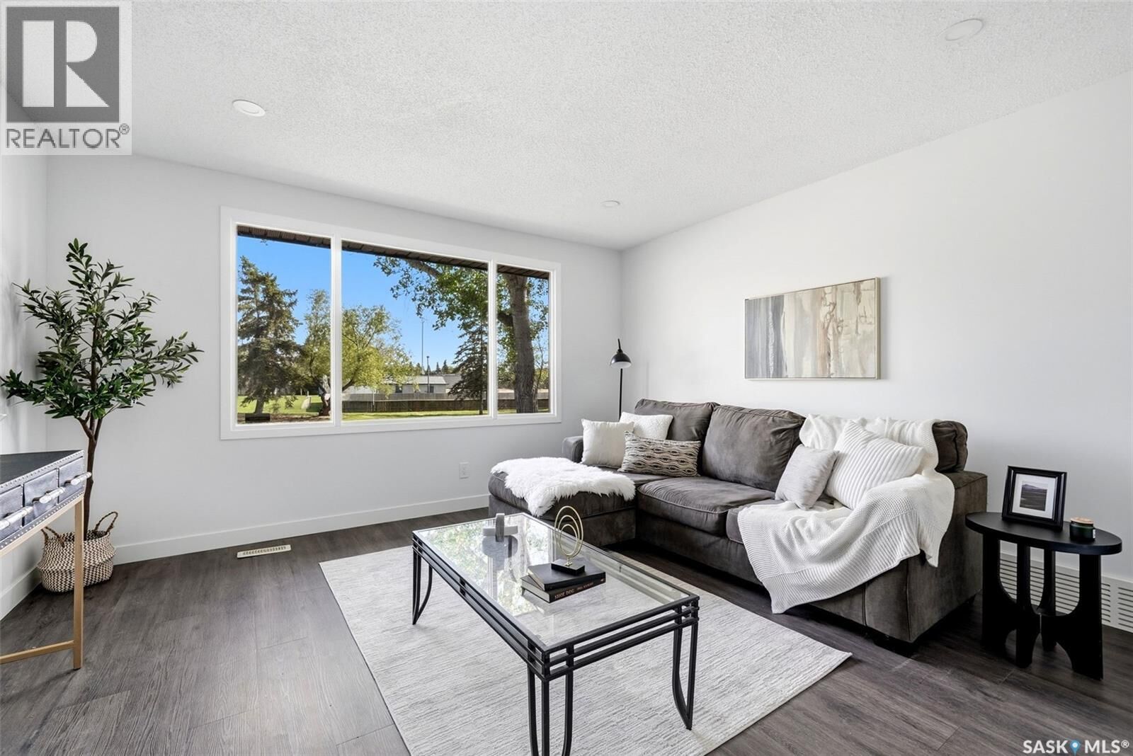 Property Photo: 127 Mackenzie Way SK S4N 5M9