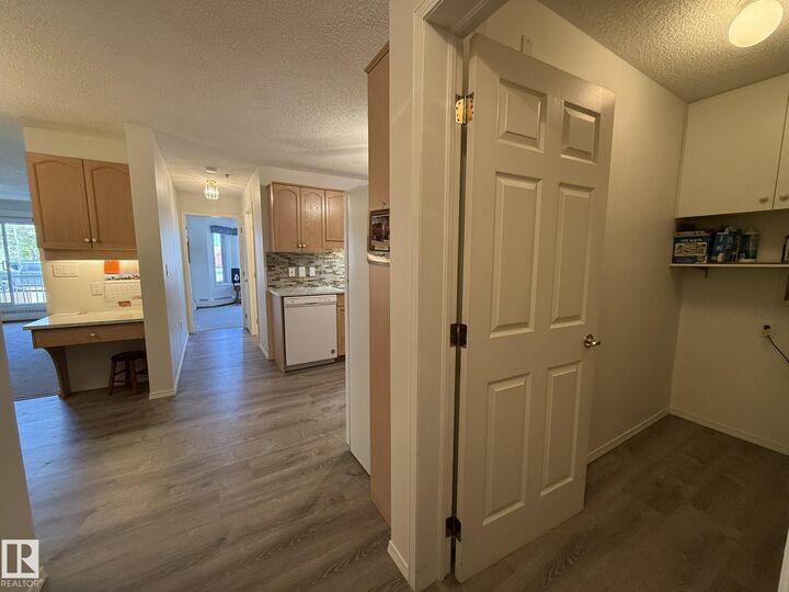 Property Photo: 10903 21 Avenue NW 102 AB T6J 7A4