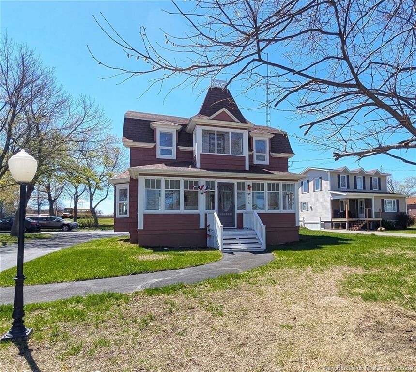 Property Photo: 216 Boul. Saint-Pierre O NB E1W 1A5
