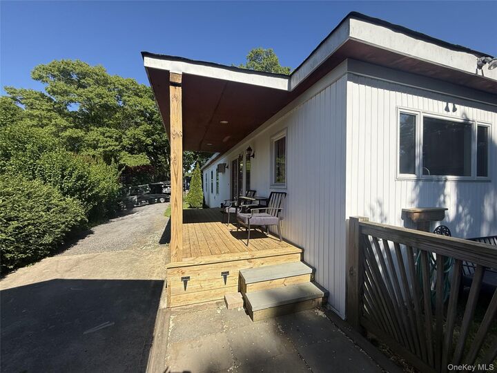 Property Photo:  18 Periwinkle  NY 11716 