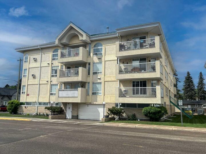 Property Photo:  5120 49 Street 301  AB T9V 0K4 