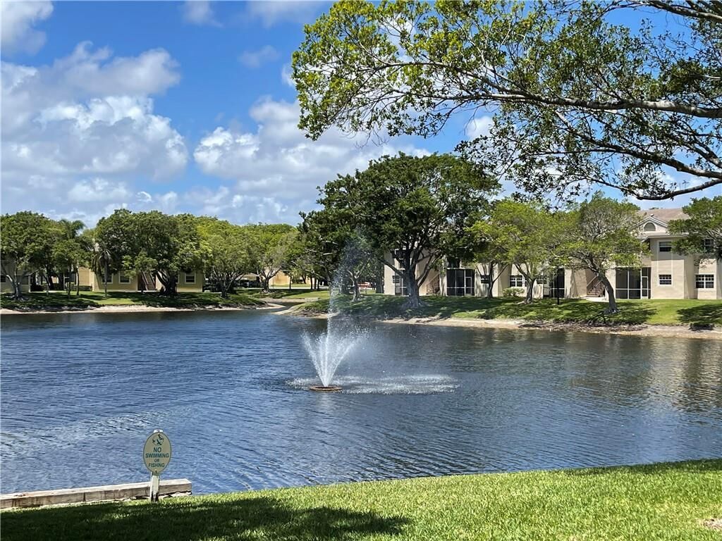 Property Photo:  640 Cypress Club Way J12  FL 33064 