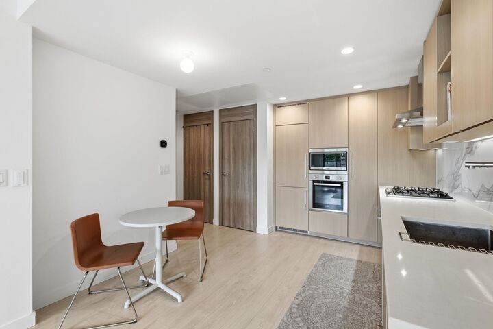 Property Photo: 4880 Lougheed Highway 306 BC V5C 0N1