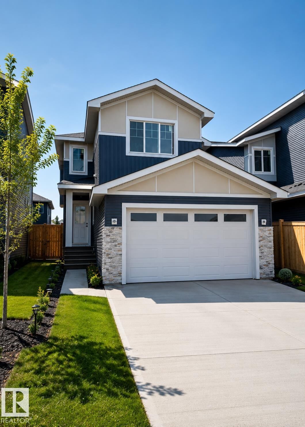 Property Photo: 163 Starling Way AB T8L 1X5