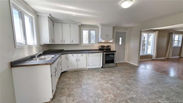 Property Photo:  25 Rue Du Portage Street  NB E1W 1A8 