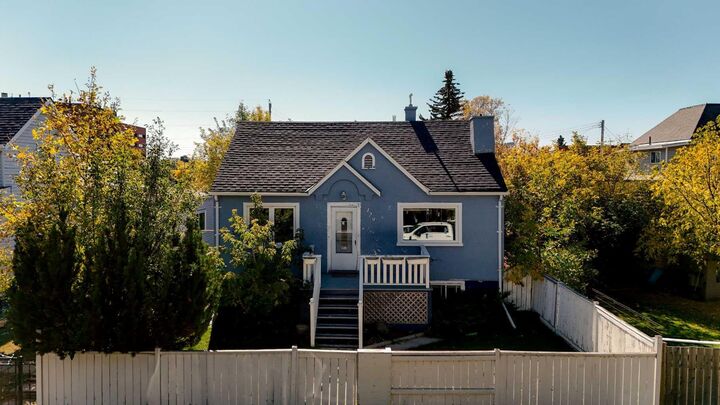 Property Photo: 129 18 Avenue NW AB T2M 0S9