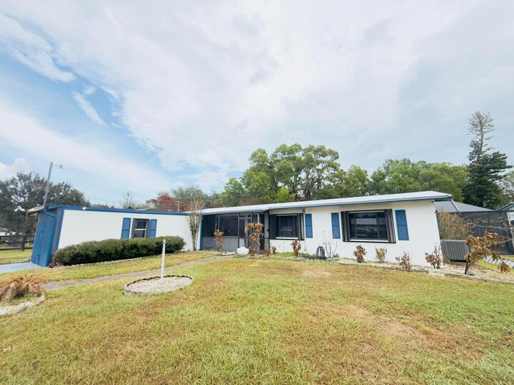 Property Photo: 4221 Rose Lane NE FL 34982
