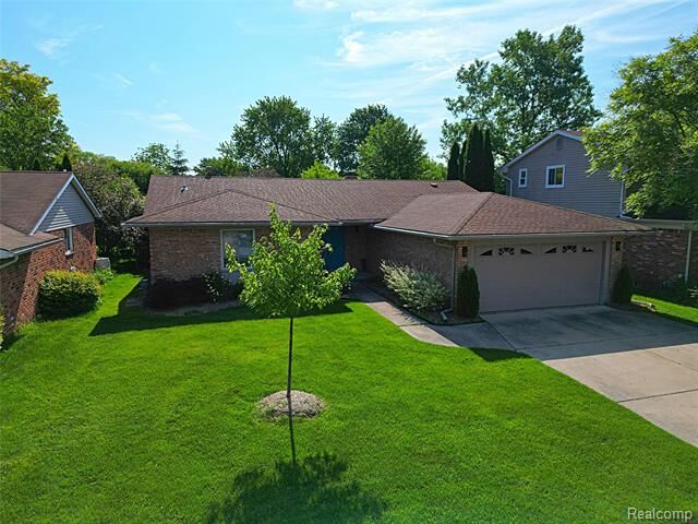 Property Photo:  6198 Raintree Drive  MI 48187 
