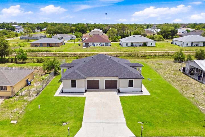 Property Photo:  225/227 Hightower Ave S  FL 33973 