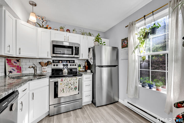 Property Photo:  745 Merrow Road 111  CT 06238 