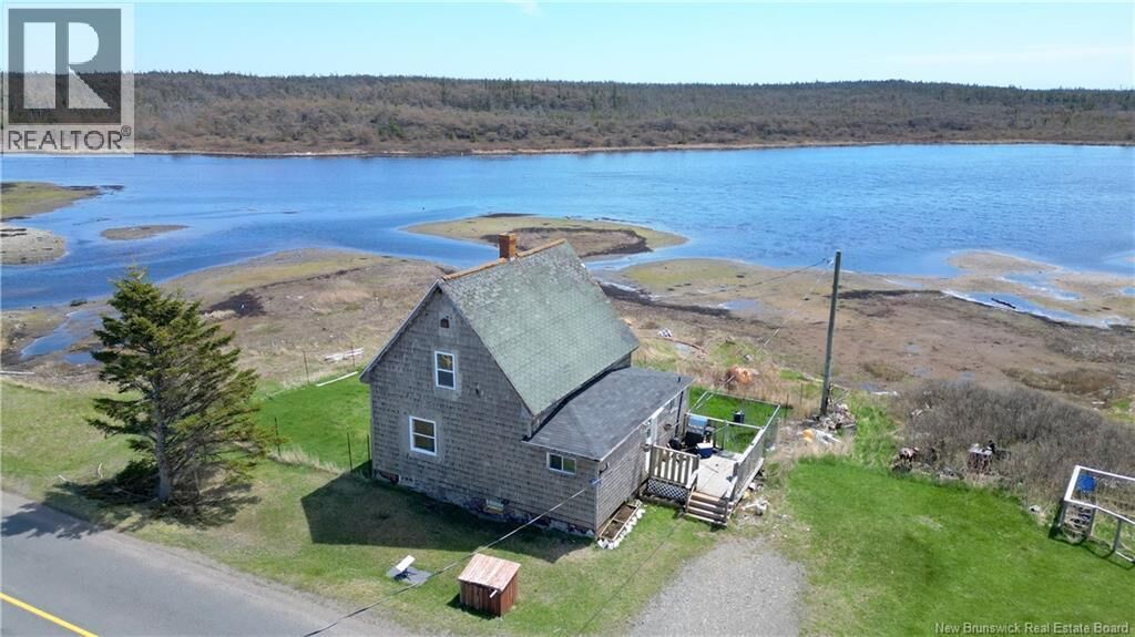 Property Photo:  202 White Head Road  NB E5G 1K6 