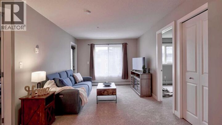 Property Photo:  403 Mackenzie Way Southwest  AB T4B 3V7 