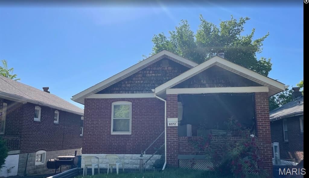 Property Photo:  8372 College Avenue  MO 63136 