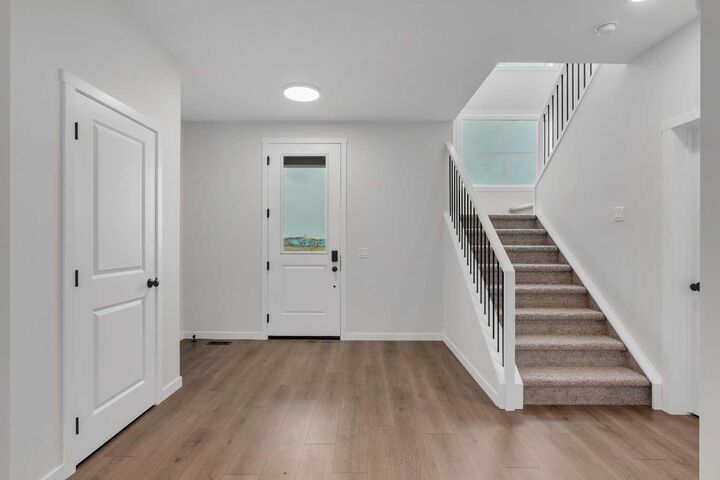 Property Photo: 50 Creekview Gardens SW AB T2X 4Y1
