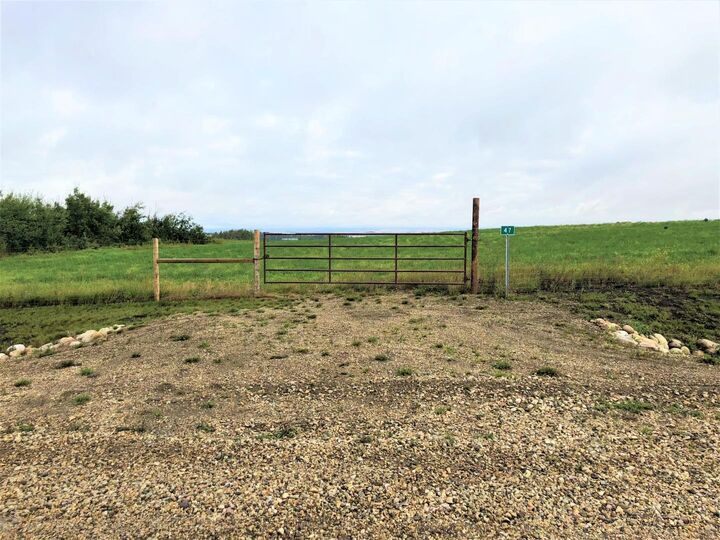 Property Photo: 47 713019 Range Road 71 AB T8W 5E9