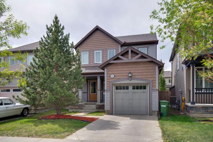 Property Photo: 943 Windsong Drive SW AB T4B 0N5