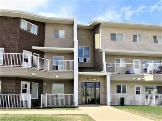 Property Photo:  201 12 Avenue SW 301  AB T0G 2A4 