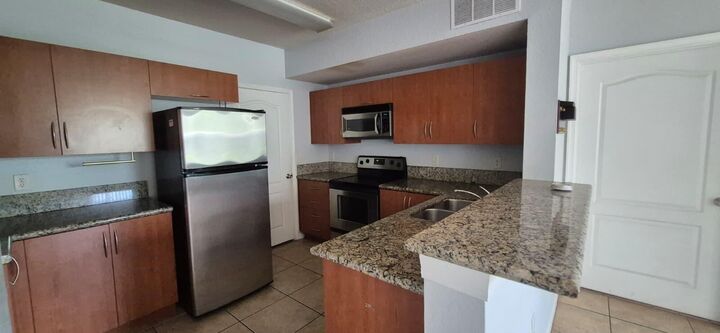 Property Photo:  138 SW Peacock Boulevard 107  FL 34986 