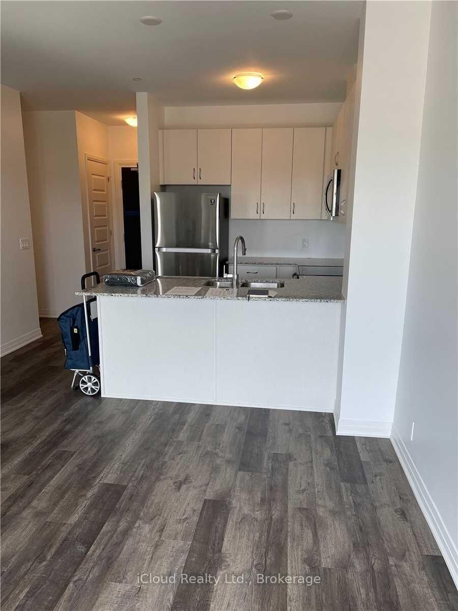 Property Photo: 102 Grovewood Common Drive 320 ON L6H 0X2
