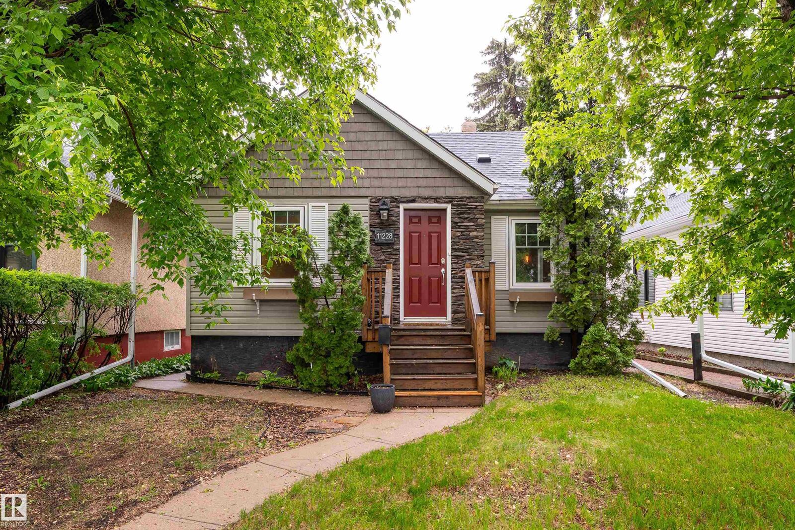 Property Photo:  11228 67 Street NW  AB T5B 1L1 
