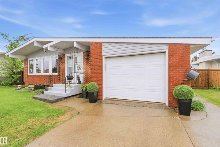 Property Photo:  11431 144 Avenue NW  AB T5X 1L7 