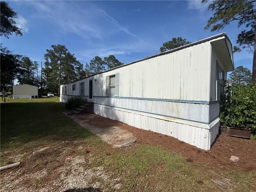 Property Photo: 64096 Mangano Road 121 LA 70452