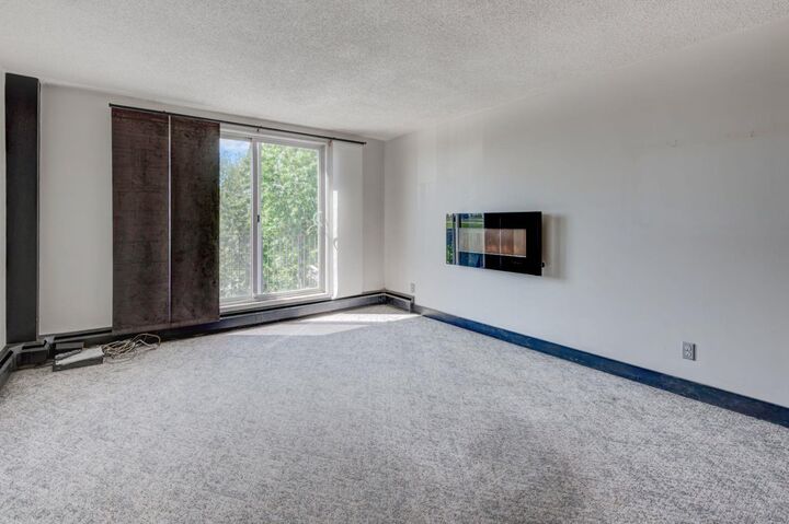 Property Photo:  80 Galbraith Drive SW 21B  AB T3E 3H2 