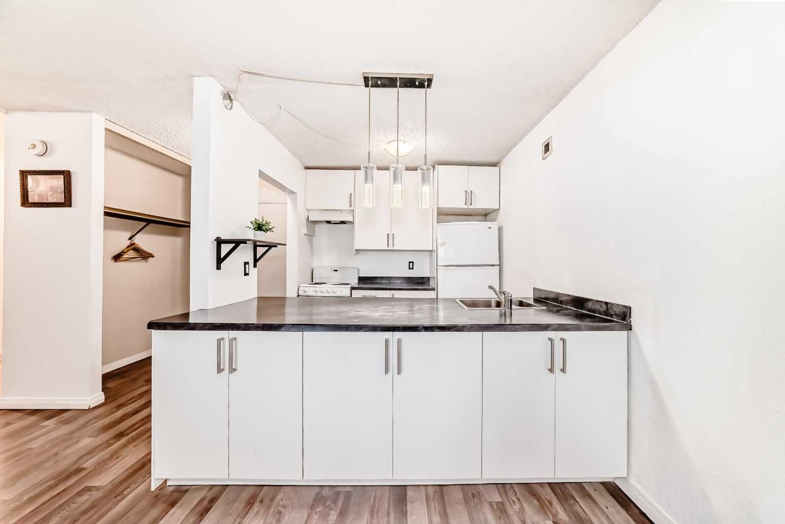 Property Photo:  221 6 Avenue SE 1403  AB T2G 4Z9 