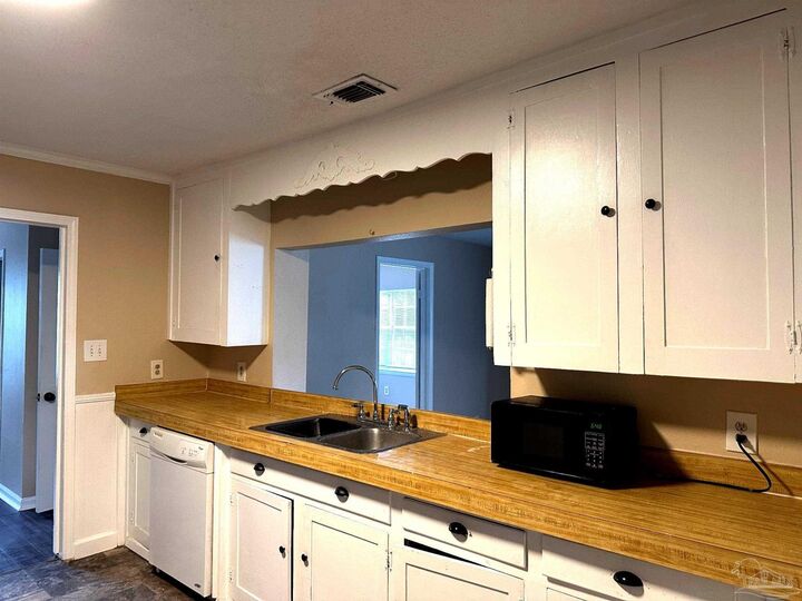 Property Photo:  3030 Muldoon Rd  FL 32526 