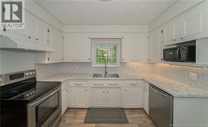 Property Photo: 16 Stonehurst Avenue NB E3C 1H1