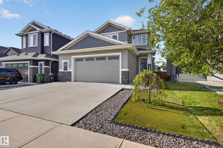 Property Photo:  457 Meadowview Drive  AB T8L 0N9 
