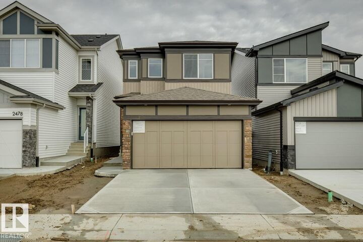 Property Photo: 2480 Egret Loop NW AB T6M 3R4