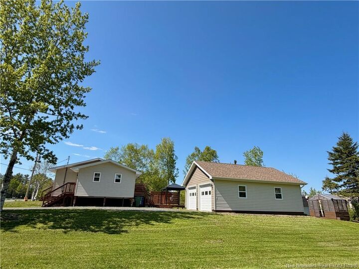 Property Photo: 393 Rue Des érables NB E8K 3M1