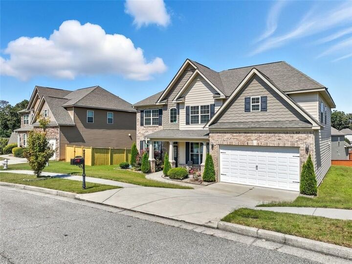 Property Photo:  1132 Cotton Oak Drive  GA 30045 