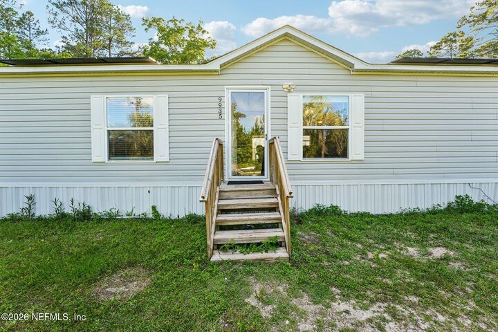 Property Photo:  9935 Amos Avenue  FL 32145 