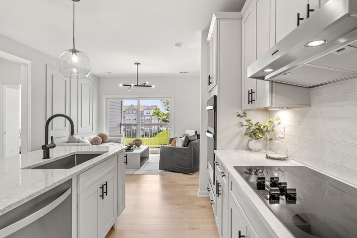 Property Photo:  30 Coppersmith Way 410  MA 02021 