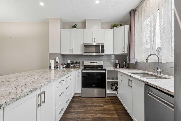 Property Photo: 291 Magnolia Square SE AB T3M 2W6