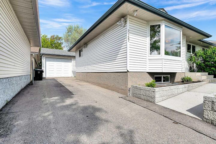 Property Photo:  7127 18 Street SE  AB T2C 1K2 