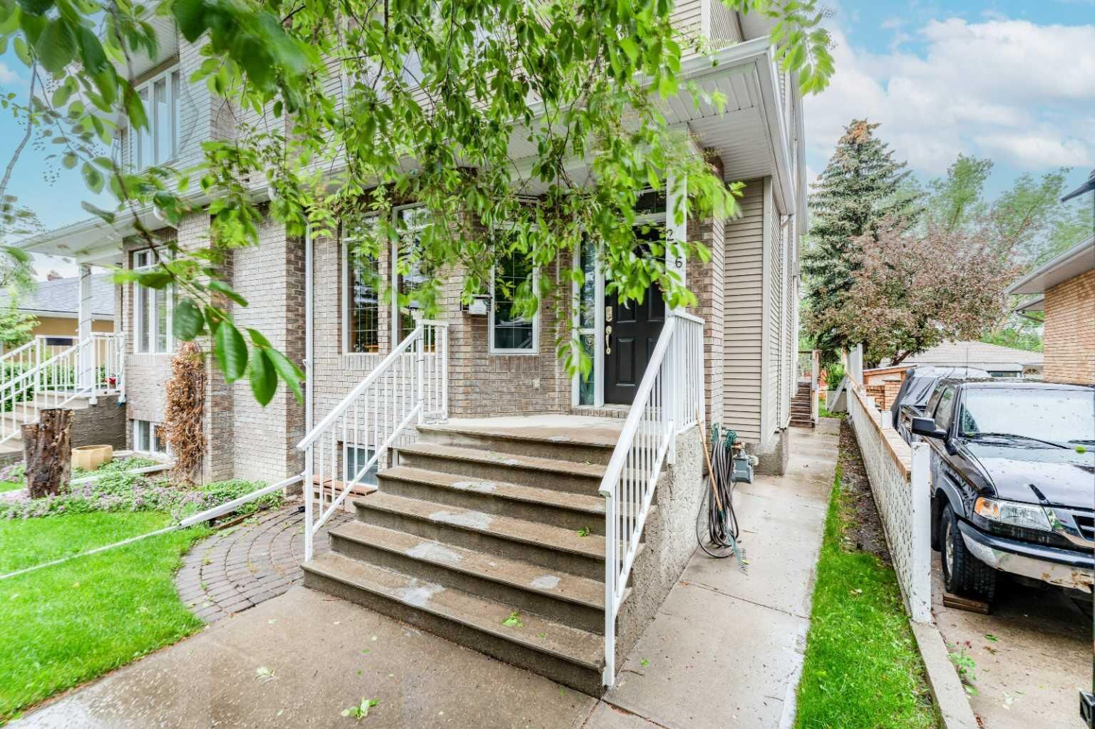 Property Photo: 256 43 Avenue NW AB T2K 0H6