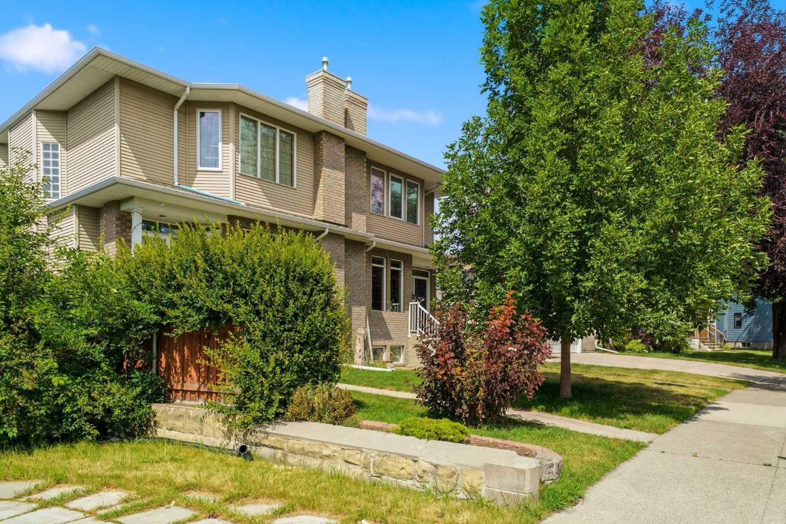 Property Photo: 256 43 Avenue NW AB T2K 0H6