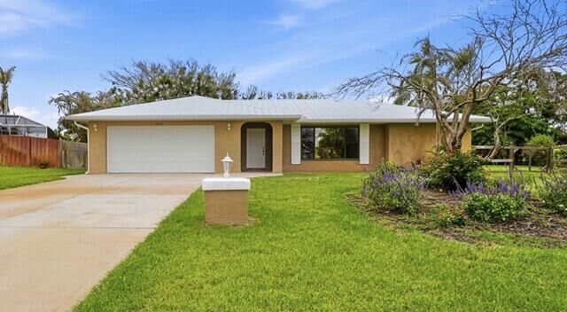 Property Photo:  2402 SE Perugia Street  FL 34952 