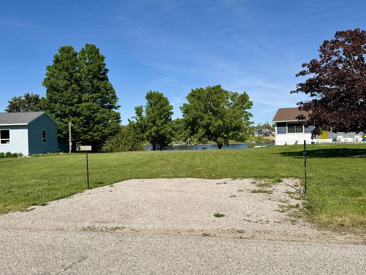 Property Photo:  10691 S Moonlight Bay Road  MI 49721 
