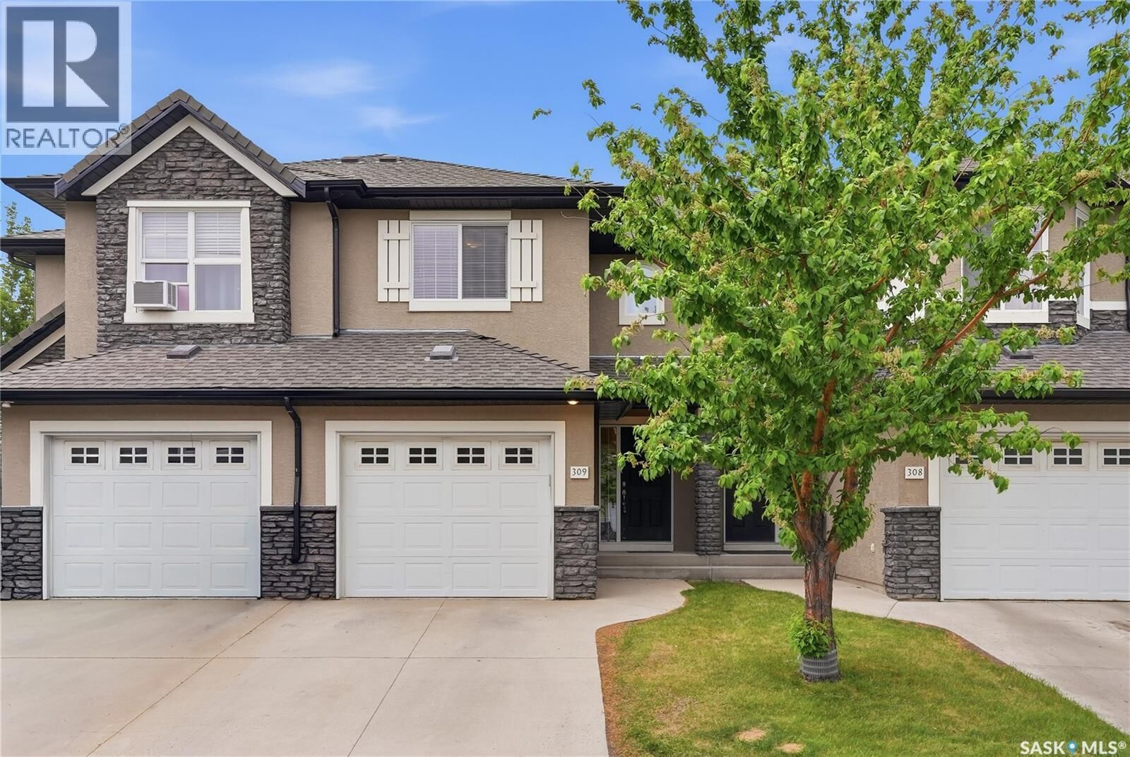 Property Photo:  309 410 Hunter Road  SK S7T 0L5 