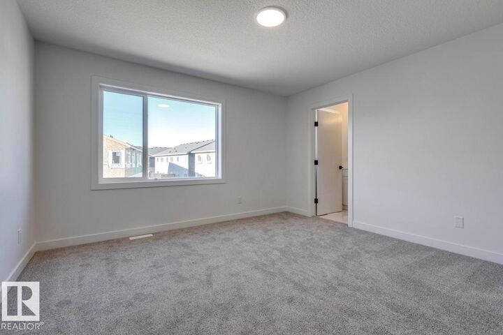 Property Photo:  710 Mattson Drive SW 9  AB T6X 1A4 